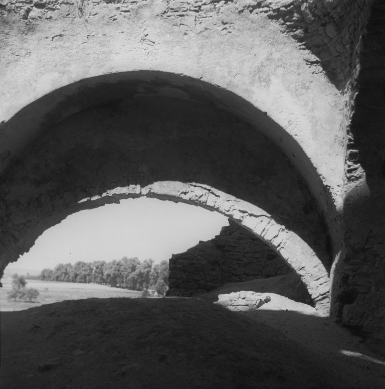Castle – fragment of arches overlooking fields
